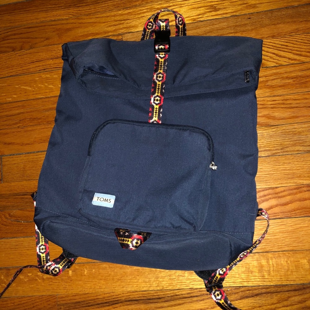 Toms fold over backpack